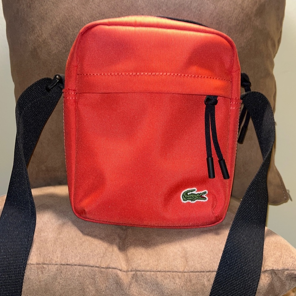 🐊 Lacoste 🐊Crossbody Bag. Orange with black strap. EUC. NS.